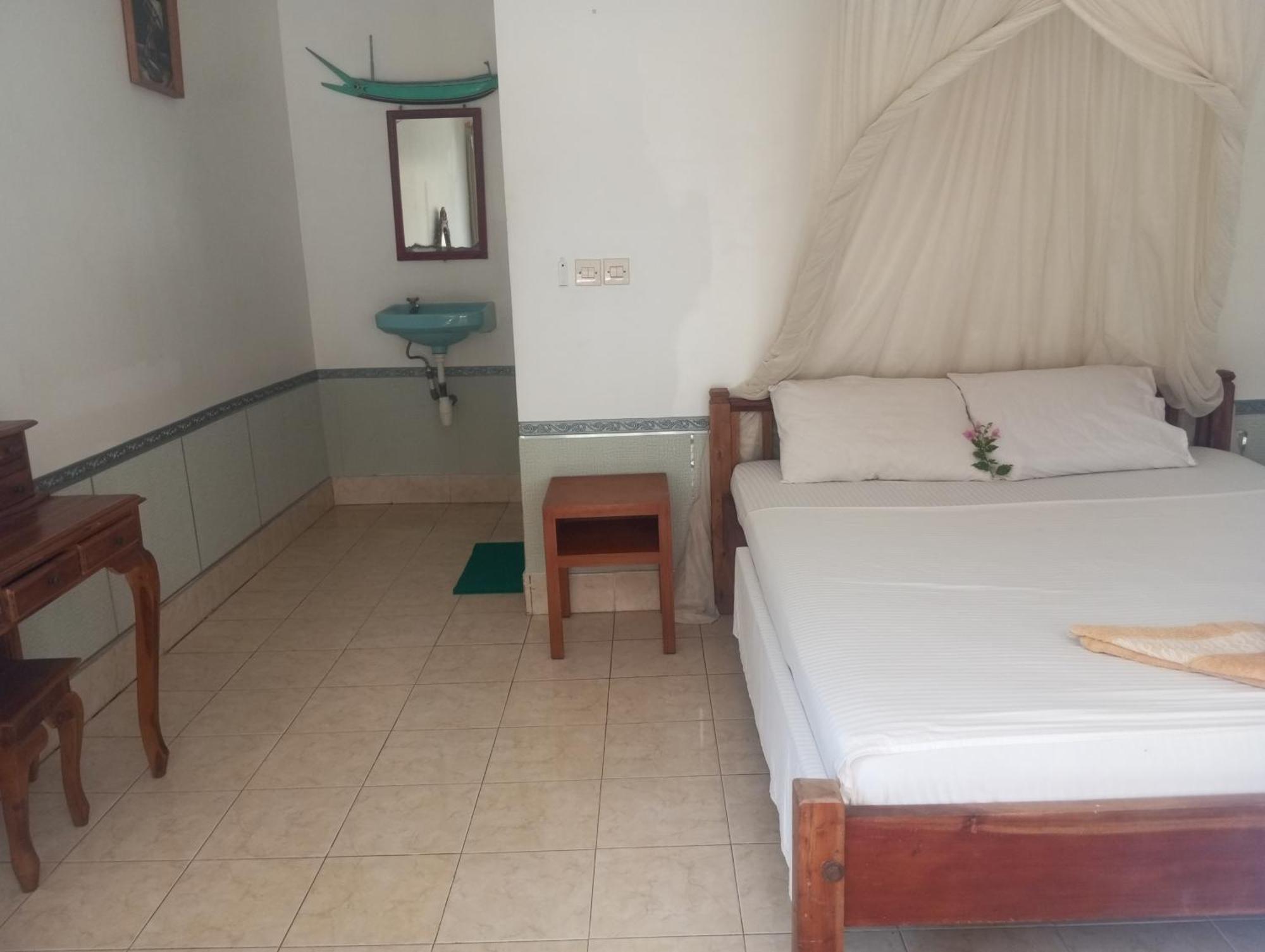 Sunrise Cafe Bungalows Amed Quarto foto